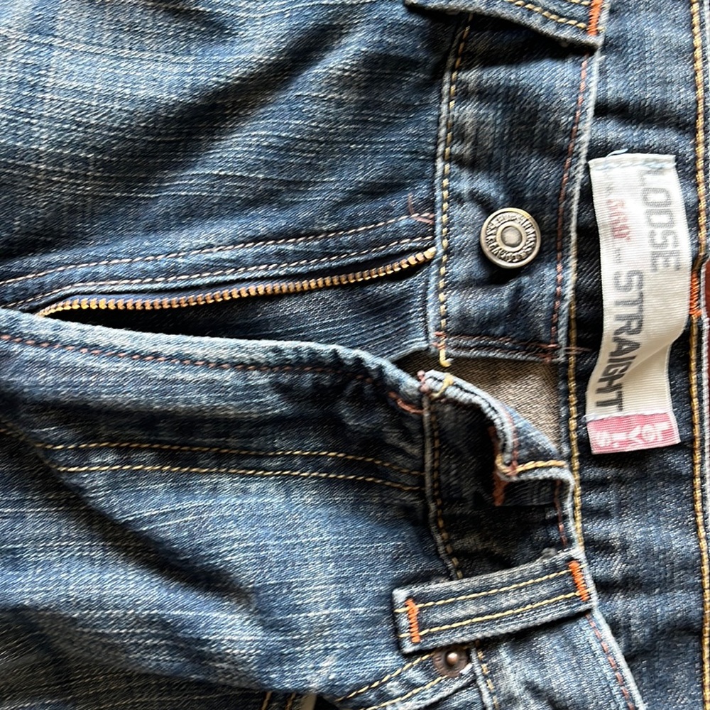 Levi’s distressed 569 loose straight men’s jeans